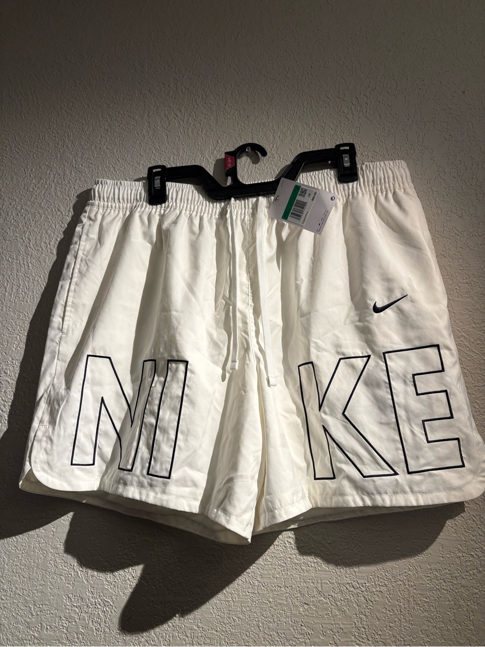 Nike White Men's Athletic Shorts with Black Outline Logo